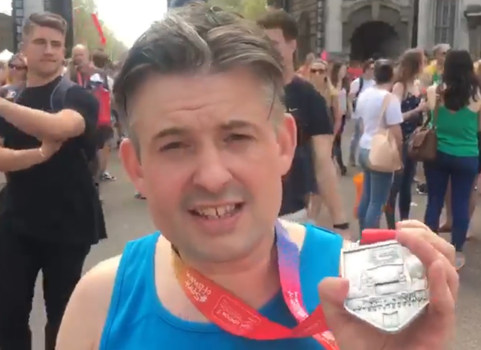 Marathon_JA with a medal 2018.jpg