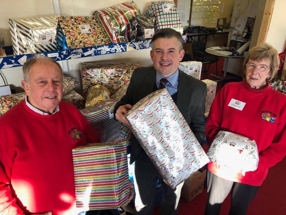Jon helps out at Toys on the Table and wraps some gifts in preparation for Christmas - Friday December 14 2018