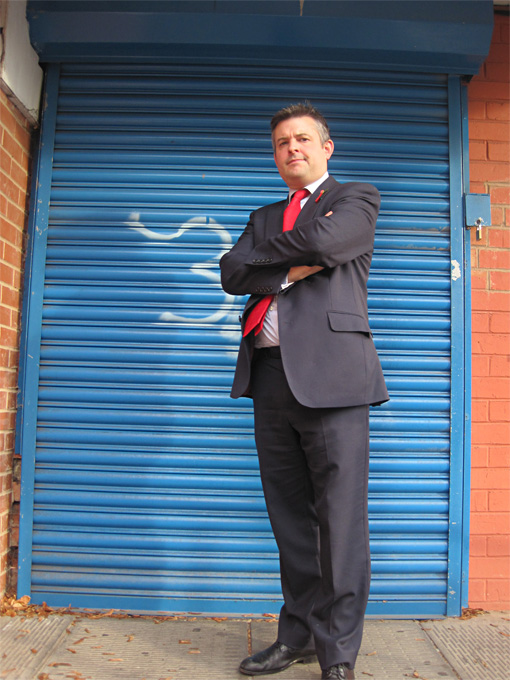 Jon on steps of the closed Practice