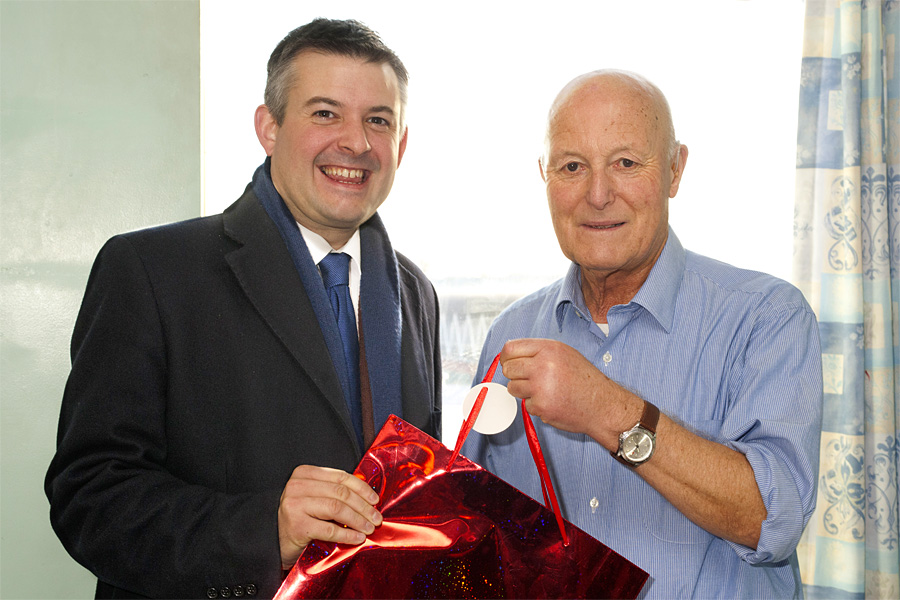 Jon presenting gift to John Lacey