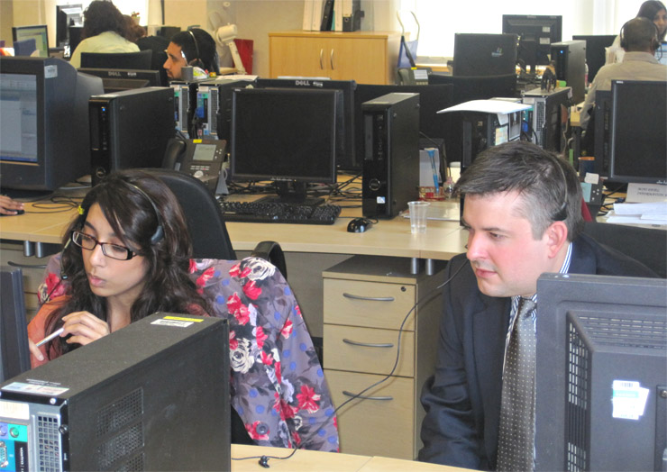 Jon listening in on an advice call at bss, Leicester