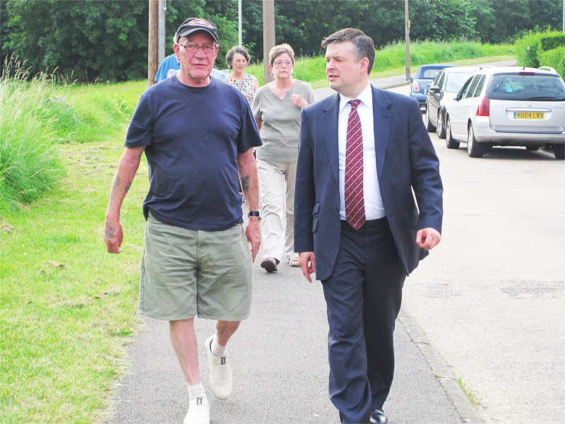 Photo shows,in the foreground, Jim Wilson and Jon