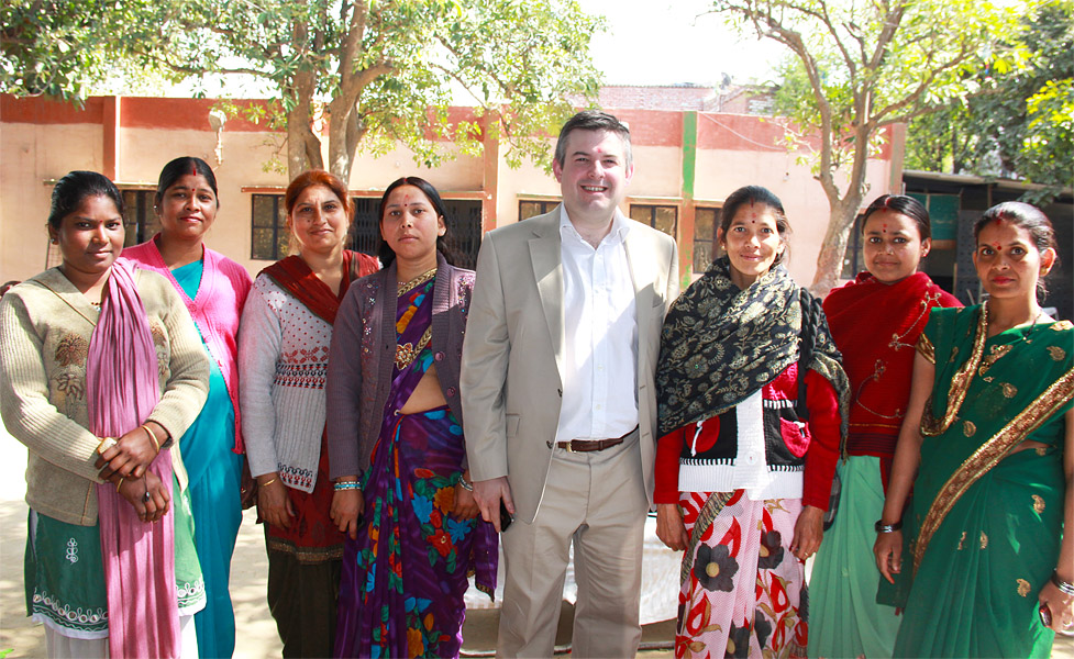 Jon with community health volunteers in the Okhla slum, Delhi