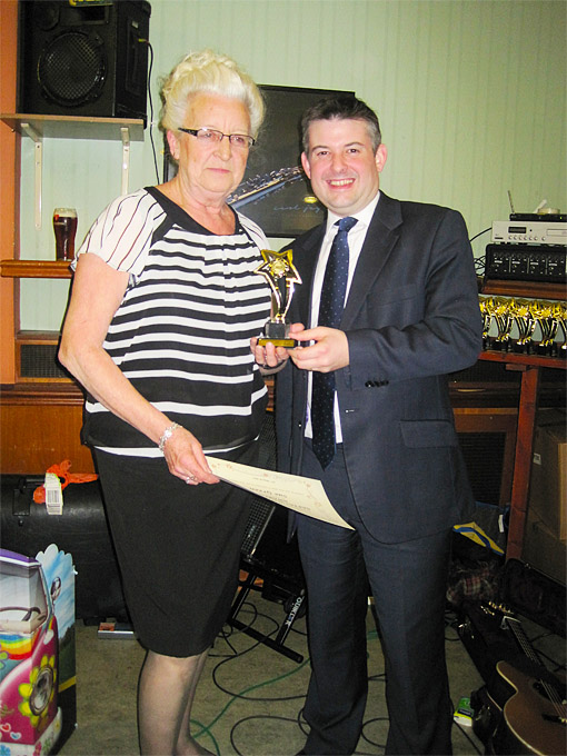 Jon presenting Sue Green from Eyres Monsell Community Association with her SAFTA
