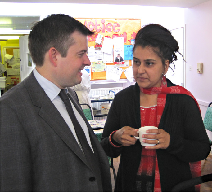 Jon talking with Sharen at the SEWA event in Leicester South